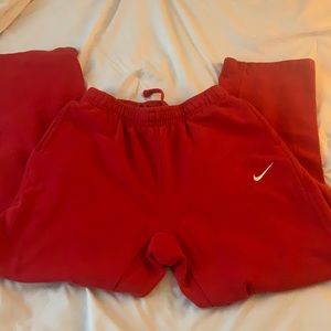 Gently worn red Nike sweatpants
